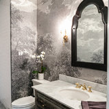 Inspiration for a timeless gray floor powder room remodel in Dallas with furniture-like cabinets, distressed cabinets, a two-piece toilet, multicolored walls, an undermount sink and white countertops