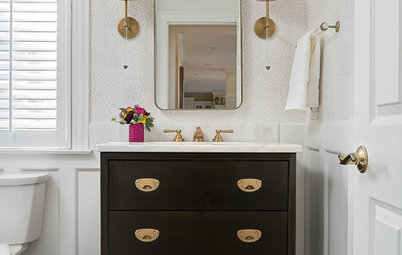 Botanical Blooms and Brass Wow in a Pretty Powder Room