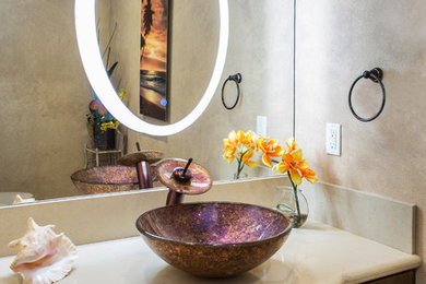 Example of a tuscan powder room design in Orange County