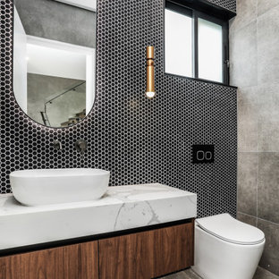 Design ideas for a contemporary powder room in Sydney.