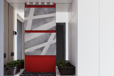 Foto di un piccolo ingresso con anticamera contemporaneo con pareti grigie, pavimento in gres porcellanato e pavimento multicolore