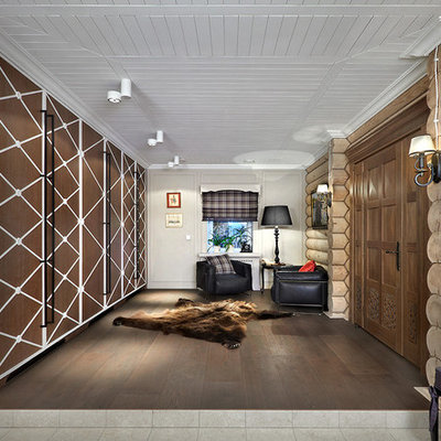 Example of a farmhouse single front door design in Yekaterinburg with a medium wood front door