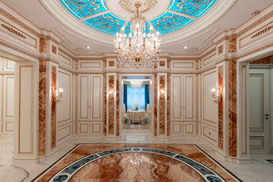 Ornate beige floor foyer photo in Other with beige walls