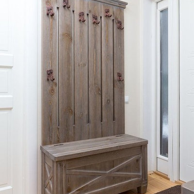 Entryway - mid-sized cottage light wood floor entryway idea in Moscow with beige walls