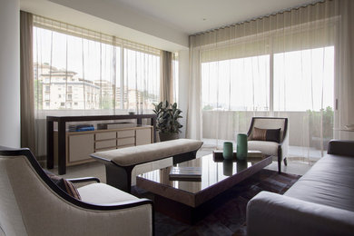 Foto de sala de estar con barra de bar abierta contemporánea de tamaño medio sin televisor con paredes blancas y suelo de baldosas de porcelana
