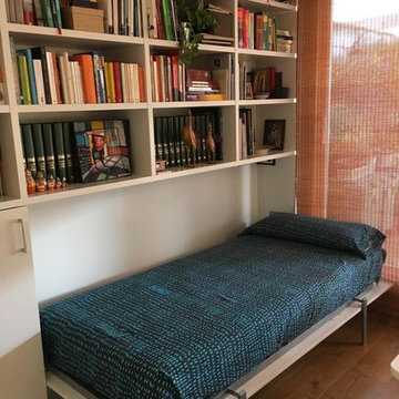 Libreria con cama abatible en Barcelona