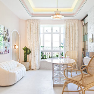 Foto de sala de estar cerrada, vintage, de tamaño medio, con paredes rosas, suelo de cemento y suelo gris