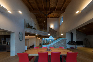 Example of a mountain style dining room design in Turin