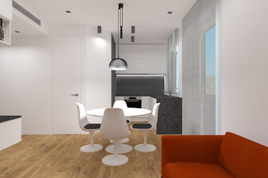Idee per una piccola sala da pranzo aperta verso il soggiorno design con pareti bianche, parquet chiaro e soffitto ribassato