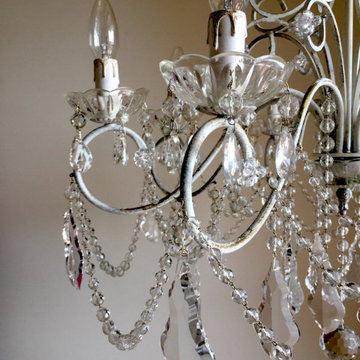 Iron chandelier with crystals for living room