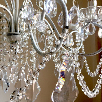 Iron chandelier with crystals for living room