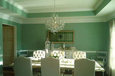 This is an example of a shabby-chic style dining room in Milan.