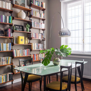 Esempio di una sala da pranzo minimal con pareti grigie, parquet scuro e pavimento marrone