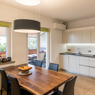 Idee per una sala da pranzo moderna con pareti bianche