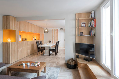 Immagine di una sala da pranzo aperta verso il soggiorno design di medie dimensioni