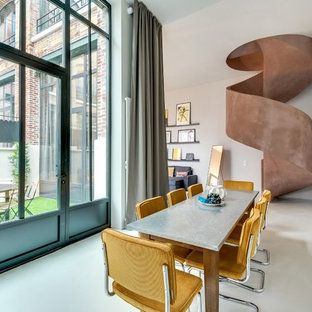 Inspiration pour une grand salle à manger ouverte sur le salon design avec un mur blanc et aucune cheminée.