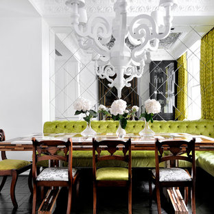Esempio di una sala da pranzo boho chic chiusa e di medie dimensioni con pareti bianche, parquet scuro e pavimento nero
