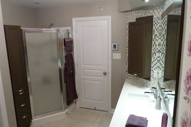 Example of a transitional gray tile and mosaic tile bathroom design in Montreal with gray walls