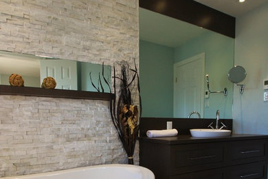 Transitional master bathroom photo in Montreal with shaker cabinets and a vessel sink