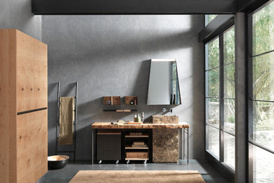 Foto di una stanza da bagno padronale minimal di medie dimensioni con pareti grigie, lavabo a colonna, top in legno, pavimento grigio e top marrone