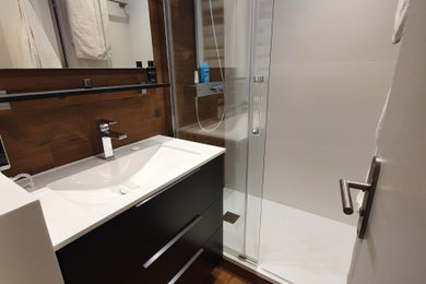 Inspiration for a medium sized country shower room bathroom in Lyon with a built-in shower, a wall mounted toilet, white tiles, ceramic tiles, brown walls, dark hardwood flooring, a submerged sink, brown floors, a sliding door, white worktops and a single sink.