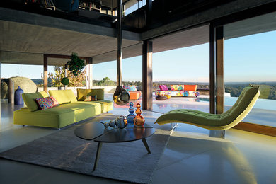 Diseño de sala de estar actual con suelo de cemento
