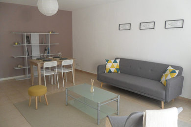Example of a trendy family room design in Marseille
