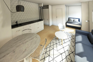 Aménagement d'une petite salle de séjour moderne ouverte avec un mur beige, parquet clair, aucune cheminée, aucun téléviseur et un sol beige.