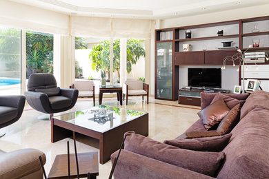 Large traditional open plan living room in Other with beige walls, no fireplace and a built-in media unit.