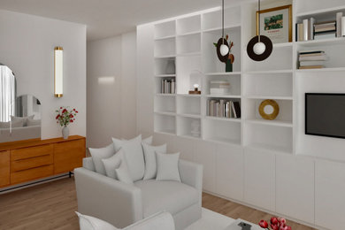 Ejemplo de biblioteca en casa abierta actual grande con paredes blancas, suelo de madera clara y televisor colgado en la pared