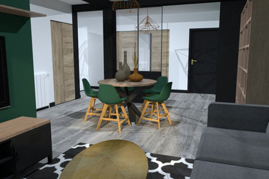 Exemple d'un salon tendance de taille moyenne et ouvert avec un mur vert, parquet clair, aucune cheminée, un téléviseur fixé au mur et un sol gris.