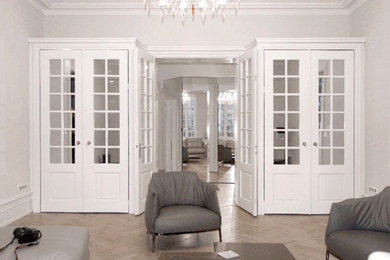 Inspiration pour un salon traditionnel de taille moyenne et fermé avec un bar de salon, un mur blanc, parquet foncé et un sol marron.