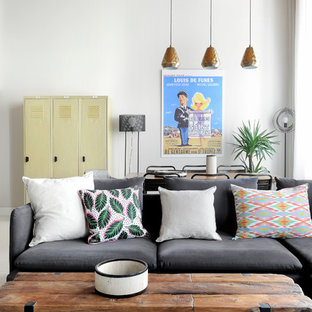Inspiration pour un salon nordique ouvert avec un mur blanc.