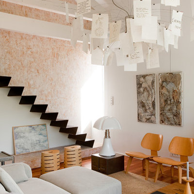 Inspiration for a small scandinavian formal light wood floor living room remodel in Paris with white walls