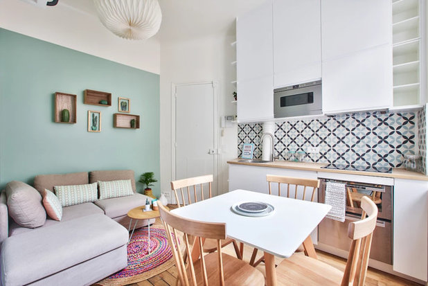 Scandinavian Living Room by NEVA Architecture Intérieure - Interior Design