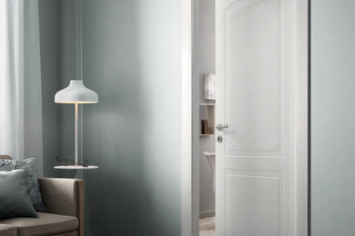 Idee per un soggiorno moderno con pareti grigie e parquet chiaro
