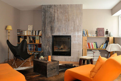 Inspiration for an eclectic living room in Lyon with grey walls.