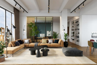 Idée de décoration pour un salon design avec un mur blanc, un sol en bois brun et un sol marron.