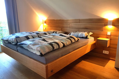 This is an example of a medium sized contemporary bedroom in Dresden.