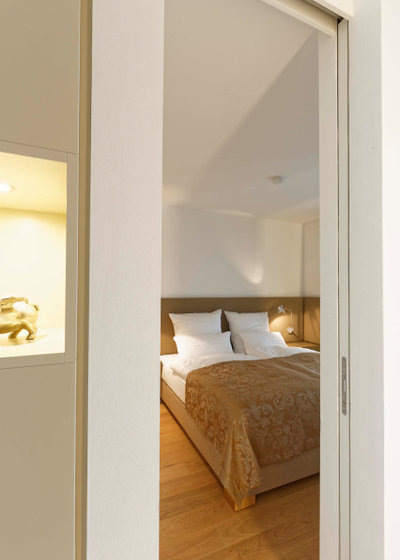 Contemporary Bedroom by Esther Strohecker Innenarchitektur