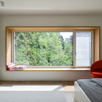 HAUS SS1 - Fensterumrahmung als Sitzbank im Schlafzimmer