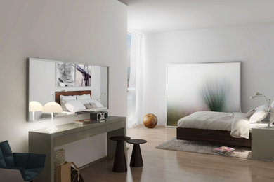 Mittelgroßes Modernes Hauptschlafzimmer ohne Kamin mit weißer Wandfarbe und braunem Holzboden in Düsseldorf