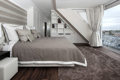 Example of a classic master dark wood floor bedroom design in Other