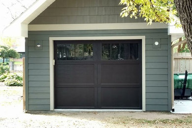Example of a mid-sized classic detached garage workshop design in Other