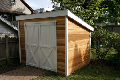 Small minimalist detached garden shed photo in Boston