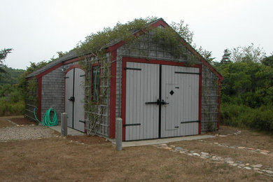 Example of a mid-sized farmhouse detached garden shed design in Boston