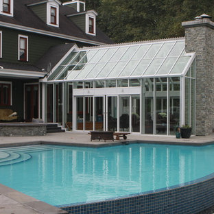 Photo of a large contemporary attached greenhouse in Vancouver.
