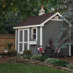 Photo of a mid-sized traditional detached garden shed in Minneapolis.