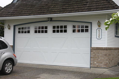 Garage - large attached garage idea in Vancouver