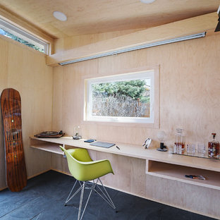 Inspiration for a small contemporary detached studio / workshop shed remodel in Denver